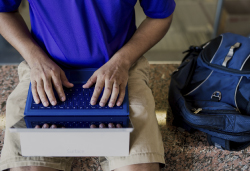 Benny G works on his laptop.