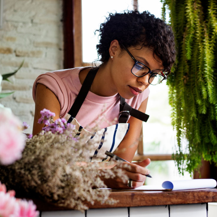 Woman working in a flower shop