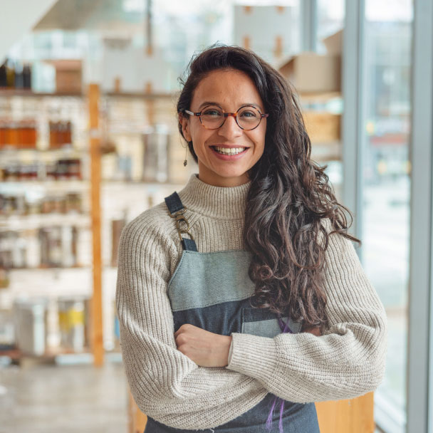 Shopkeeper minds her store.