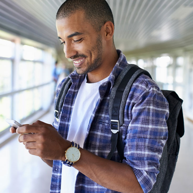 Man checking his accounts on his phone.