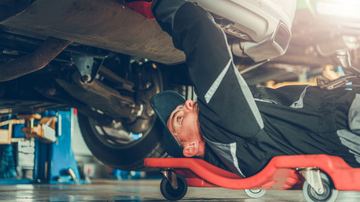 Man repairing a car